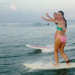 Women surfing in Matapalo, Costa Rica.