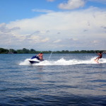 Red on the jet ski and Casey wake surfing.
