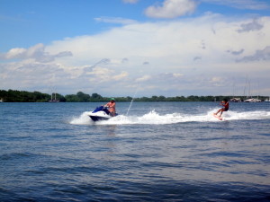 Red on the jet ski and Casey wake surfing.