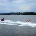 Casey on the jet ski and Red wake surfing.
