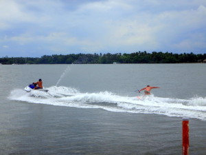 Casey on the jet ski and Red wake surfing.