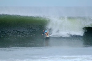 Aloe Driscoll surfing in El Salvador.