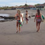 Women surfing in Miramar, Nicaragua